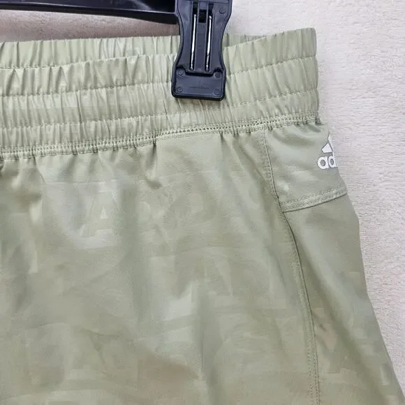 ADIDAS WOMEN'S MEDIUM PACER WOVEN DEBOSS TRAINING/RUNNING SHORTS LIME HK7544 NWT - Picture 2 of 6